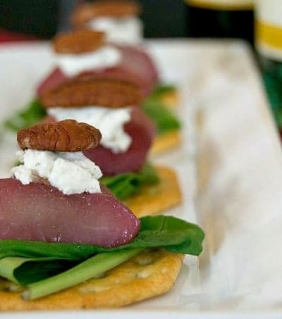 A great holiday appetizer - Merlot poached pears, arugula, and goat cheese. Flavor in every bite!