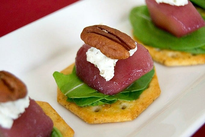 A great holiday appetizer - Merlot poached pears, arugula, and goat cheese. Flavor in every bite!