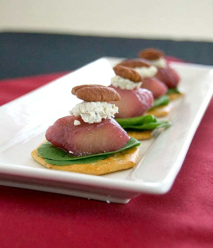 A great holiday appetizer - Merlot poached pears, arugula, and goat cheese. Flavor in every bite!