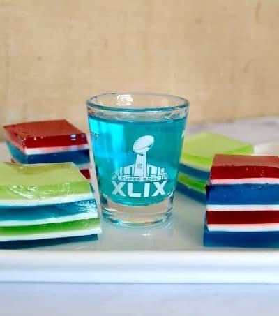 Game Day Jelly Shots - cubes of flavored gelatin in your favorite team colors spiked with flavored vodka for extra fun!