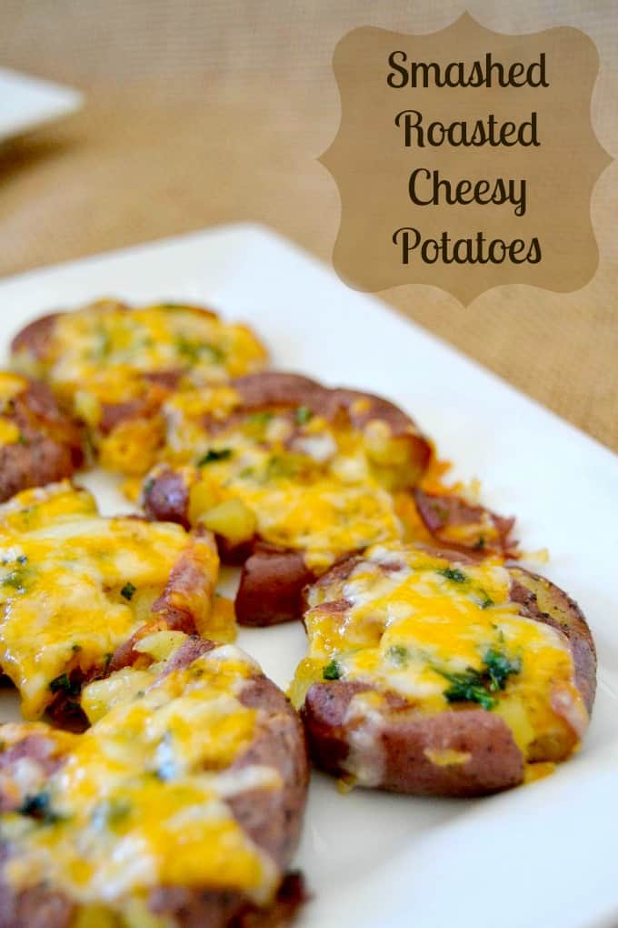Smashed Roasted Cheesy Potatoes - roasted ruby gold potatoes smashed, seasoned and topped with Cheddar-Monterey Jack cheese to make an awesome side dish!