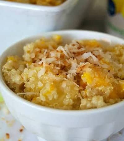 This salad of pineapple, mango and Mandarin oranges mixed with quinoa cooked in coconut milk is sure to remind you of a beach and warmer weather!