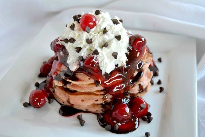 Buttermilk Pancakes with chocolate chips and diced Maraschino cherries - a delectable breakfast treat!