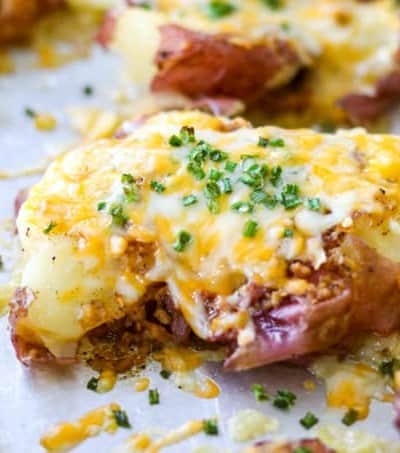 Small potato roasted and covered with cheese.