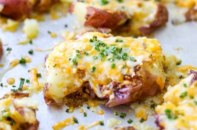 Small potato roasted and covered with cheese.