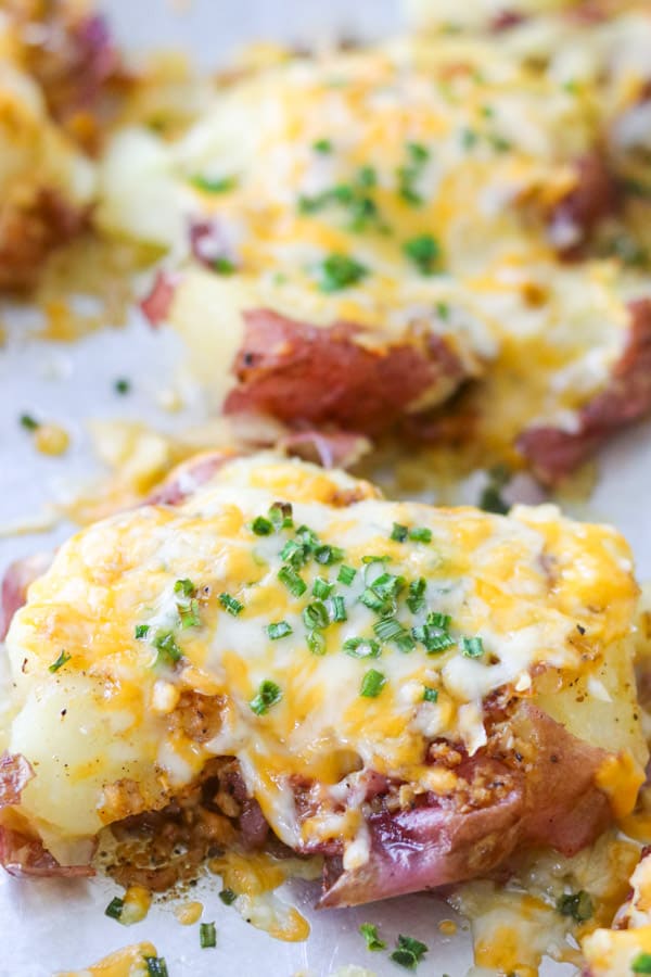 Small potatoes roasted with cheese and chives.