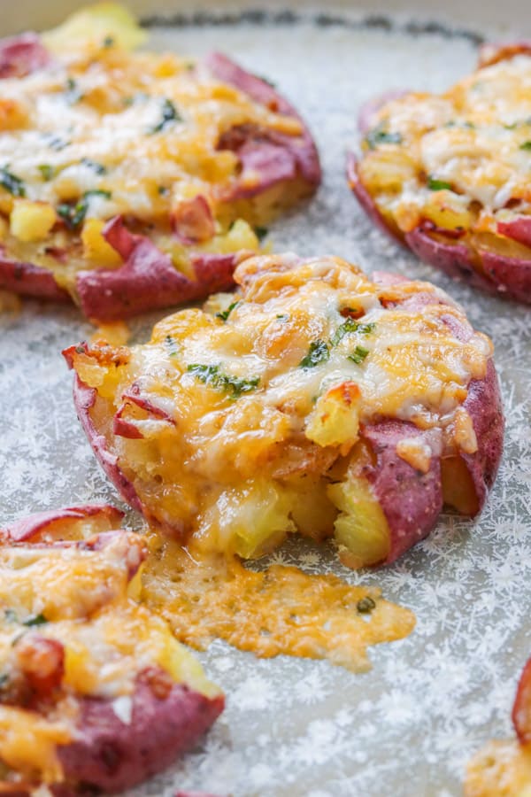 https://www.365daysofbakingandmore.com/wp-content/uploads/2015/02/Smashed-Roasted-Cheesy-Potatoes-PIN4.jpg