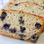 Thick layers of banana bread with blueberries.