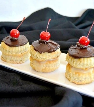 Boston Cream Puff Cakes - rounds of Pepperidge Farm Puff pastry filled with cream topped with chocolate ganache!