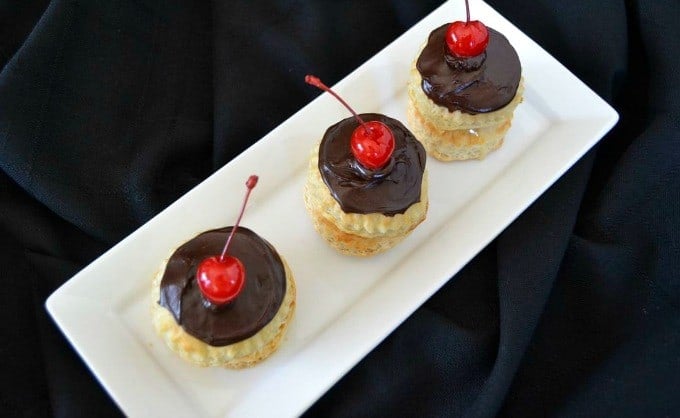 Boston Cream Puff Cakes - rounds of Pepperidge Farm Puff pastry filled with cream topped with chocolate ganache!