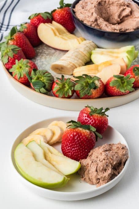 Fruit with a chocolate dessert dip made with peanut butter.