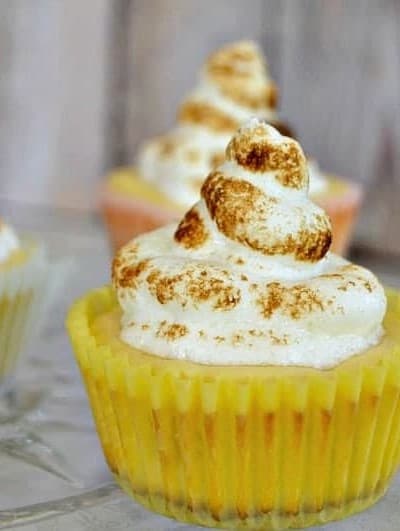 These Lemon Meringue Cheesecakes are a tasty combination of a cheesecake and lemon meringue pie for the perfect Springtime and Easter dessert!