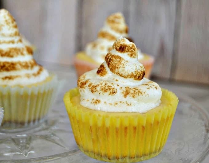 These Lemon Meringue Cheesecakes are a tasty combination of a cheesecake and lemon meringue pie for the perfect Springtime and Easter dessert!