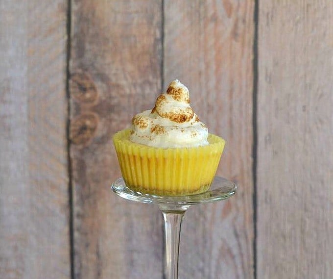 These Lemon Meringue Cheesecakes are a tasty combination of a cheesecake and lemon meringue pie for the perfect Springtime and Easter dessert!