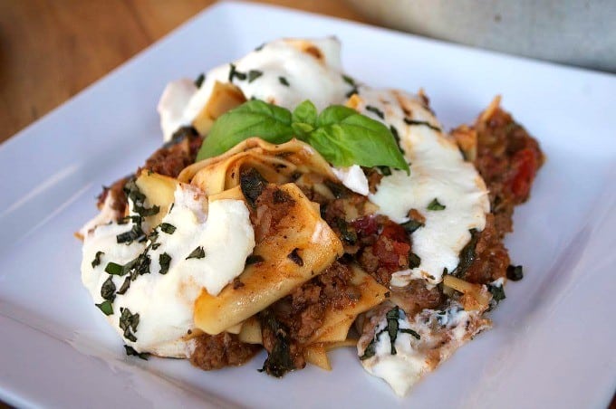 Lasagna made in a skillet with spinach. It makes for a great busy weeknight dinner!