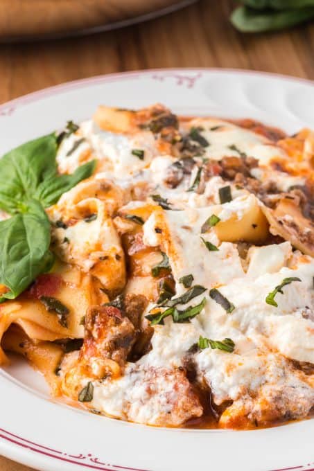 Skillet lasagna made with spinach and fresh mozzarella cheese.