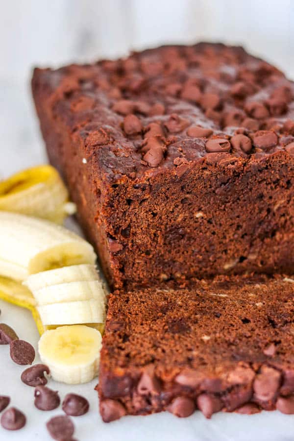 A loaf of Double Chocolate Banana Bread - banana bread with double chocolate from cocoa powder and chocolate chips.