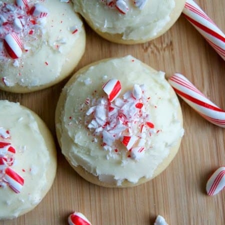 A soft sugar cookies covered in peppermint frosting and crushed candy canes.