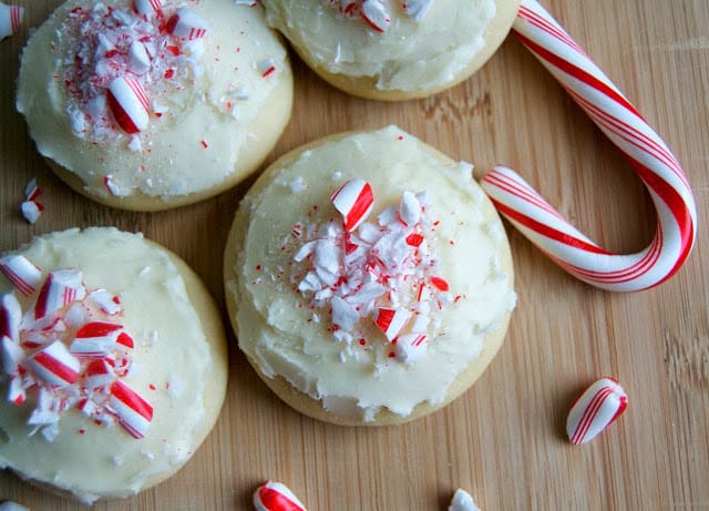 A soft sugar cookies covered in peppermint frosting and crushed candy canes.