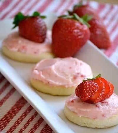 Soft Sugar Cookies frosted with a fresh strawberry buttercream. - perfect for summer!