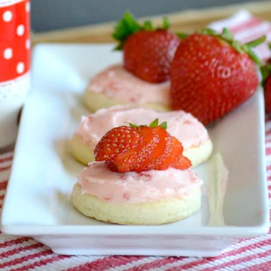 Soft Sugar Cookies frosted with a fresh strawberry buttercream. - perfect for summer!