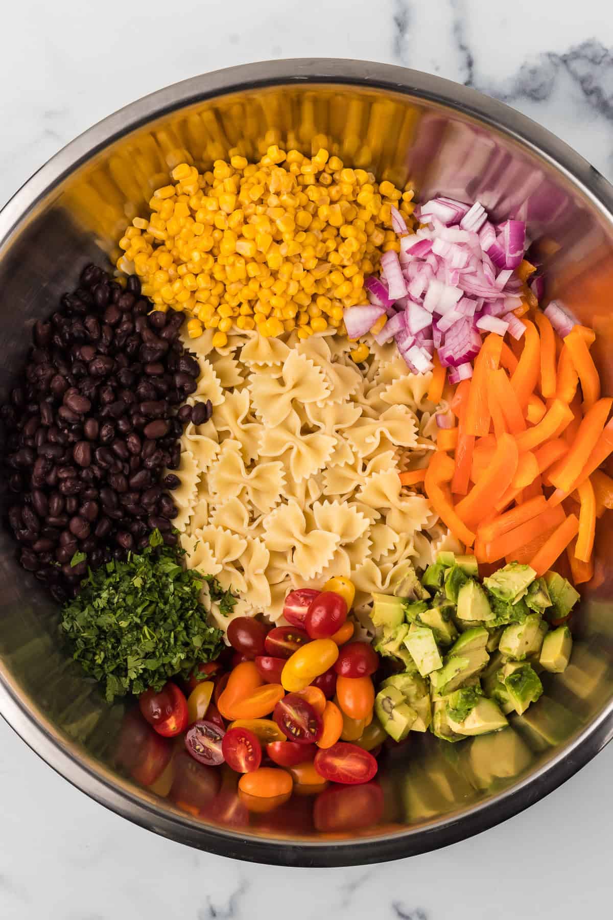 Ingredients for a southwest inspired salad with pasta.