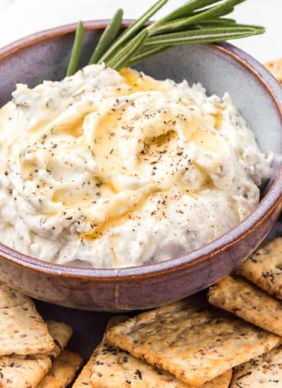 An easy appetizer - goat cheese, honey and rosemary.