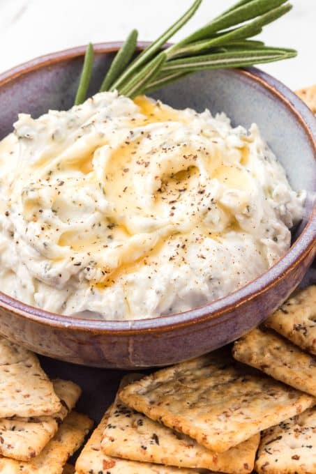 An easy appetizer - goat cheese, honey and rosemary.