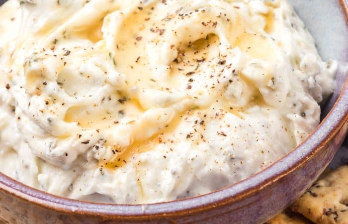 An easy appetizer - goat cheese, honey and rosemary.