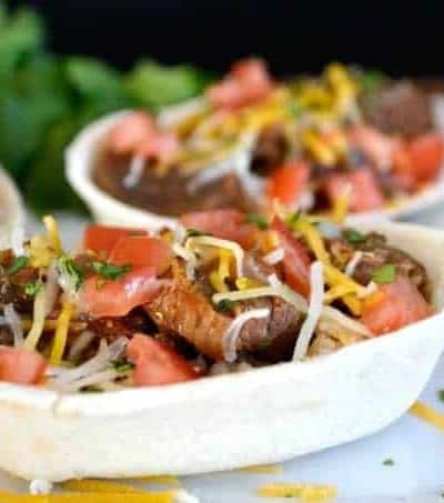 A great back to school weeknight dinner - Slow Cooker Carne Asada Taco Boats!