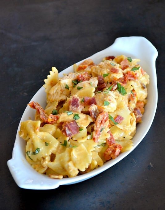 Farfalle pasta tossed with some seasoned cooked chicken tenders, sundried tomatoes and bacon in a creamy mozzarella sauce.