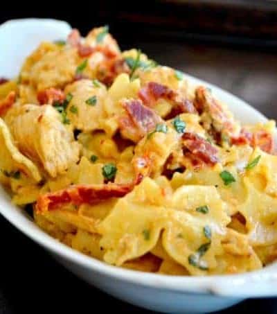 Farfalle pasta tossed with some seasoned cooked chicken tenders, sundried tomatoes and bacon in a creamy mozzarella sauce.