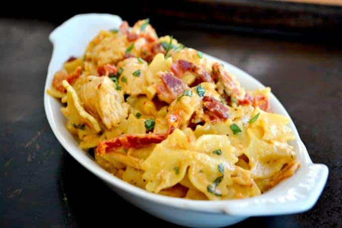 Farfalle pasta tossed with some seasoned cooked chicken tenders, sundried tomatoes and bacon in a creamy mozzarella sauce.