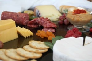 Creating a colorful, appealing and tasty cheese board for entertaining is easy with these ingredients!