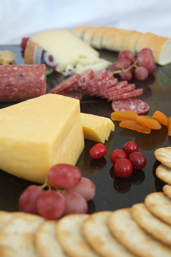 Creating a colorful, appealing and tasty cheese board for entertaining is easy with these ingredients!