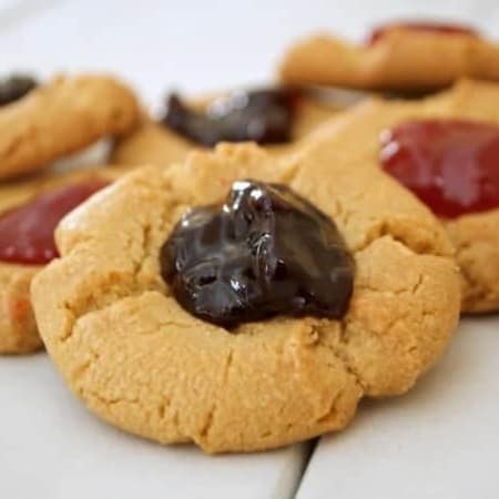 A simple peanut butter cookie indented in the middle and filled with strawberry preserves. It's a peanut butter and jelly sandwich in cookie form.