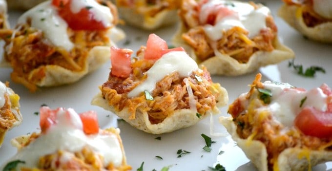 The perfect Game Day appetizer - Chicken Enchilada Bites with a Green Chile Enchilada Cream Sauce!