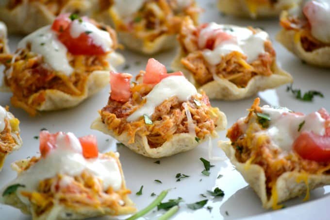 The perfect Game Day appetizer - Chicken Enchilada Bites with a Green Chile Enchilada Cream Sauce!