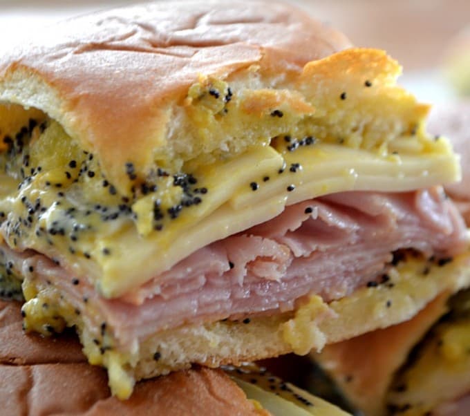 These Ham and Cheese Party Sandwiches on Hawaiian rolls with a poppy seed, mustard spread are perfect for your Game Day entertaining!