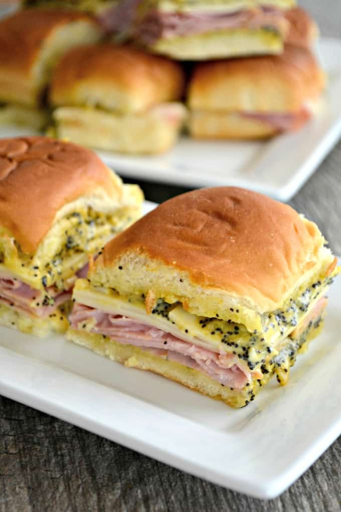 These Ham and Cheese Party Sandwiches on Hawaiian rolls with a poppy seed, mustard spread are perfect for your Game Day entertaining!