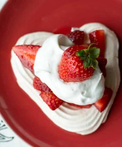 Heart Meringues with Berries and Cream- so light and refreshing, they're a perfect dessert for Valentine's Day.