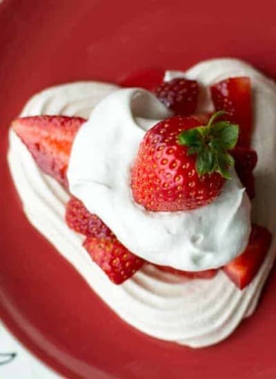 Heart Meringues with Berries and Cream- so light and refreshing, they're a perfect dessert for Valentine's Day.