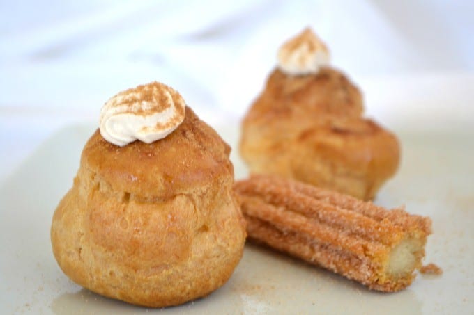 These Churro Cream Puffs are a simple Pâte à Choux filled with a sweetened cinnamon whipped cream and sprinkled with some cinnamon sugar to top it off.