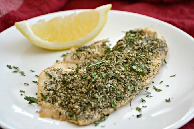 This Steamed Lemon Herb Tilapia is seasoned with fresh lemon, dill, garlic powder and other spices then steamed in the oven in a tin foil packet.