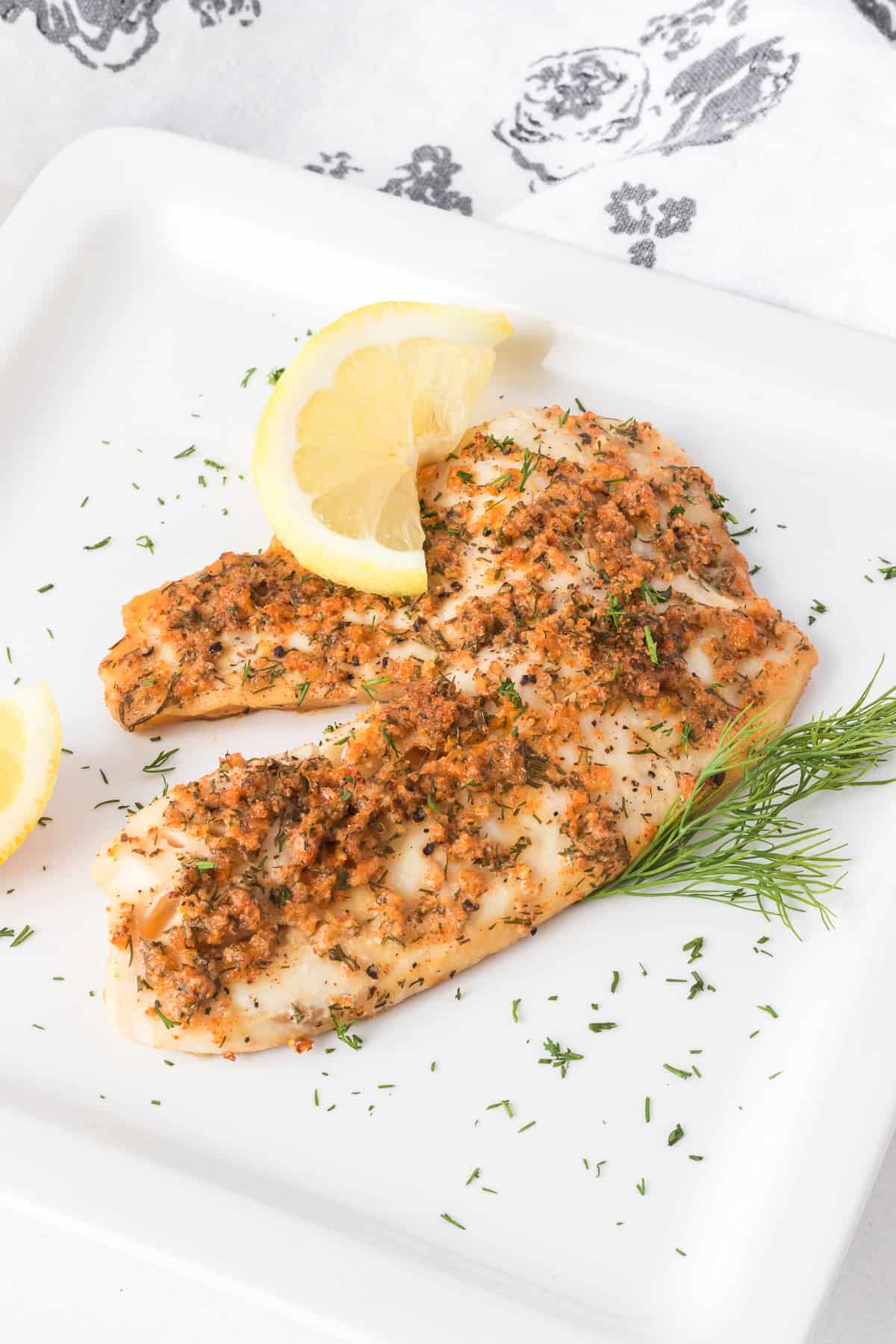 Seasoned tilapia that's been steamed.