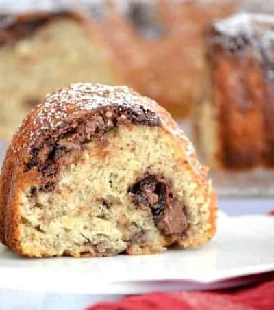 This Nutella Swirl Banana Bundt Bread is Nutella mixed in to a banana bread batter and shaped into a beautiful bundt cake - perfect with a cup of coffee!