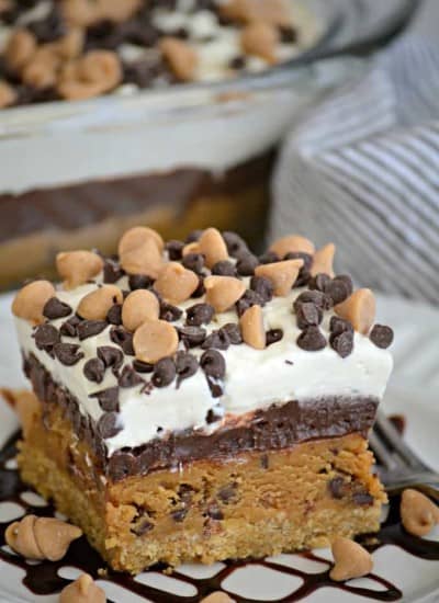 Peanut Butter Cookie Dough Dream Bars topped with mini chocolate and peanut butter chips for a fabulous no bake dessert to wow family and friends!