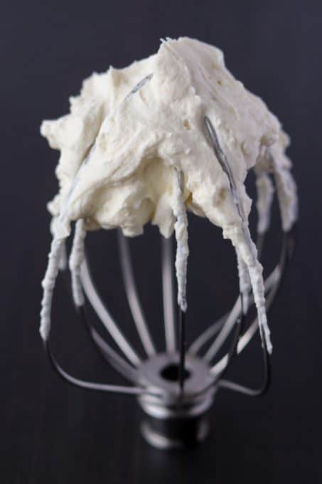 Whipped Cream with Cream Cheese on a whisk.