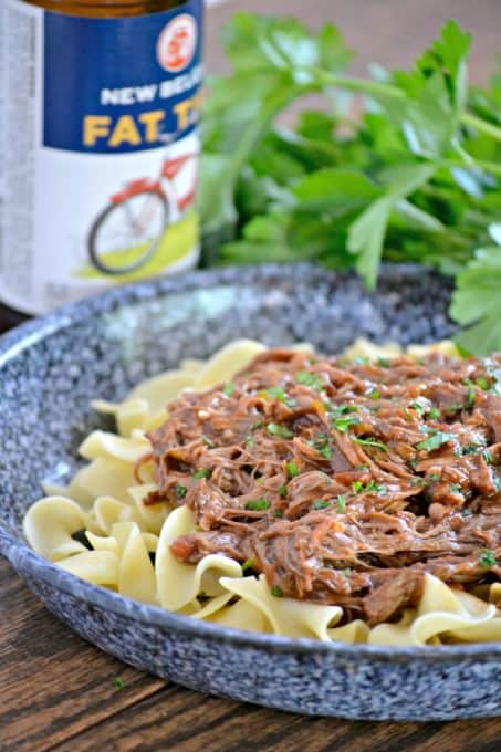 An easy dinner made in the slow cooker, this Chili Beer Pot Roast can also be made with with beef broth if you'd prefer no alcohol.