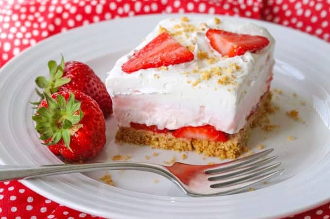 A slice of Strawberry Cheesecake Dream Bars.